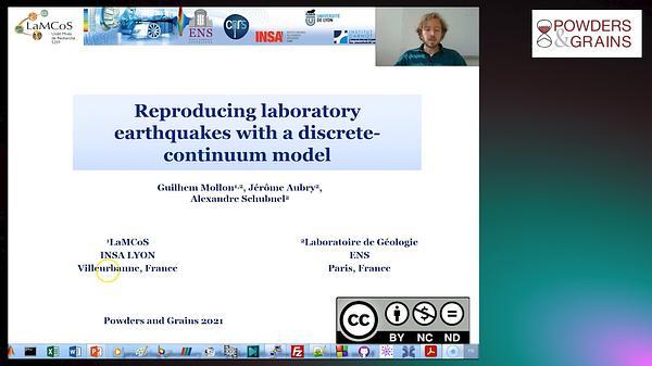 Reproducing laboratory earthquakes with a discrete-continuum model